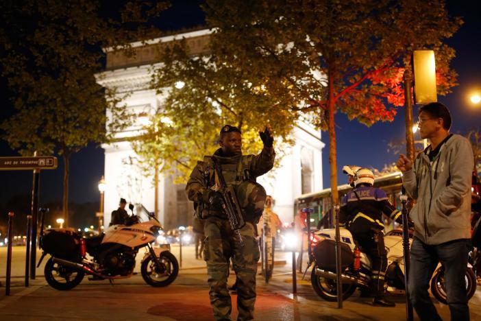 An armed soldier secures a side road near the Champs Elysees Avenue after a shooting incident in Paris, France, April 20, 2017. REUTERS/Benoit Tessier