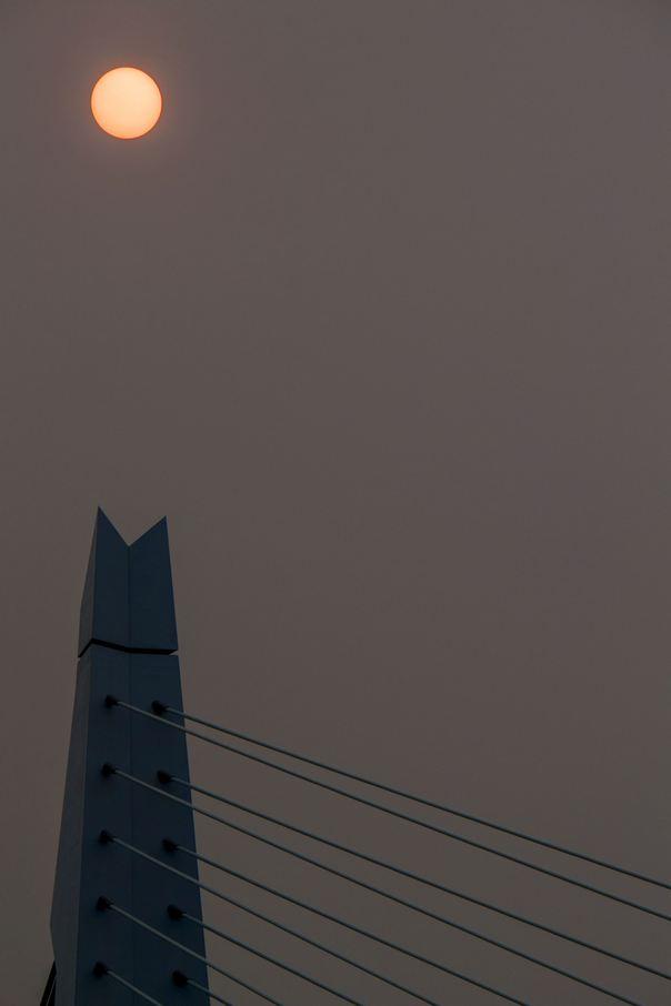 A picture taken on October 16, 2017, in Rotterdam, Netherlands, shows the sky and sub after it turned a yellow-ochre colour due to sand from the Sahara desert and dust from wildfires in Portugal being carried by wind from the Storm Ophelia. Photo by Robin Utrecht/ABACAPRESS.COM