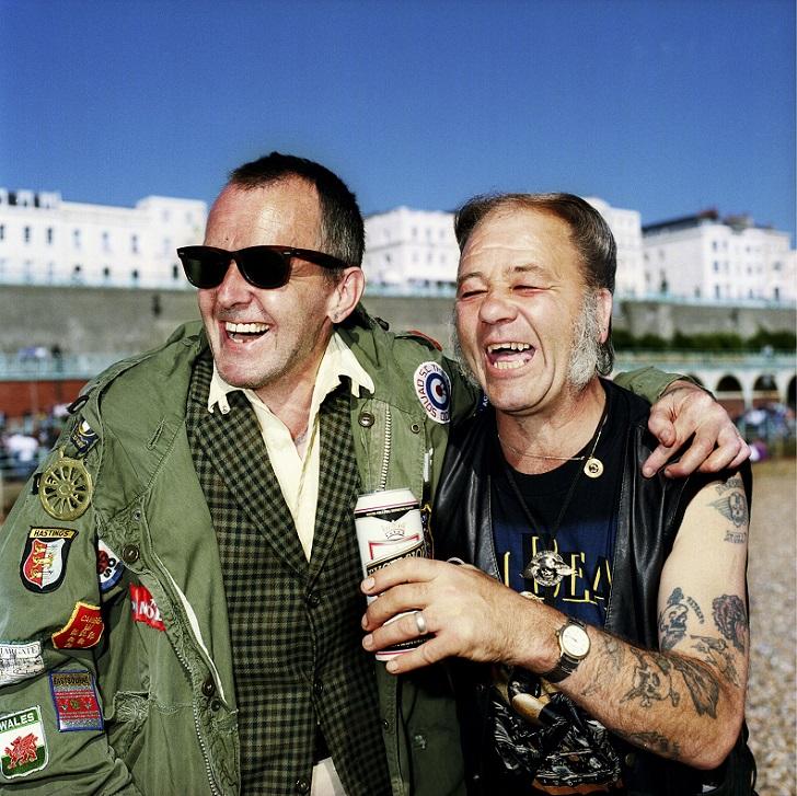 MANDATORY CREDIT: Muir Vidler/REX Shutterstock. Only for use in this story. Editorial Use Only. Strictly no stock, books, advertising or merchandising without photographer's permission Mandatory Credit: Photo by Muir Vidler/REX Shutterstock (4896699g) "Ray Cooke and Steve Howard were photographed on Brighton beach. Ray has been a mod since he was a teenager, now he's part of the Odd Mod Squad SC who do runs down to Brighton every summer. He bumped into Steve that day - they'd never met but they had a lot to talk about." Rebels Without A Pause: Portrait series of Britain's ageing rebels and mavericks, Britain - 2000 FULL COPY: http://www.rexfeatures.com/nanolink/qshk A photographer has shot a fascinating portrait series of Britain's ageing rebels and mavericks. Rebels Without a Pause by Muir Vidler documents those who have refused to let their stage of life define who they are - or curtail non-conformist lifestyles. They include pensioner mods and rockers, a fire-breathing retired circus performer and a Chinese Elvis impersonator.