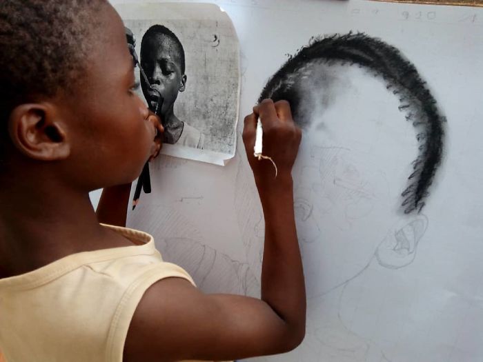 At-11-years-old-boy-makes-hyperrealistic-drawings-that-will-impress-him-5b3c041f6d482__700