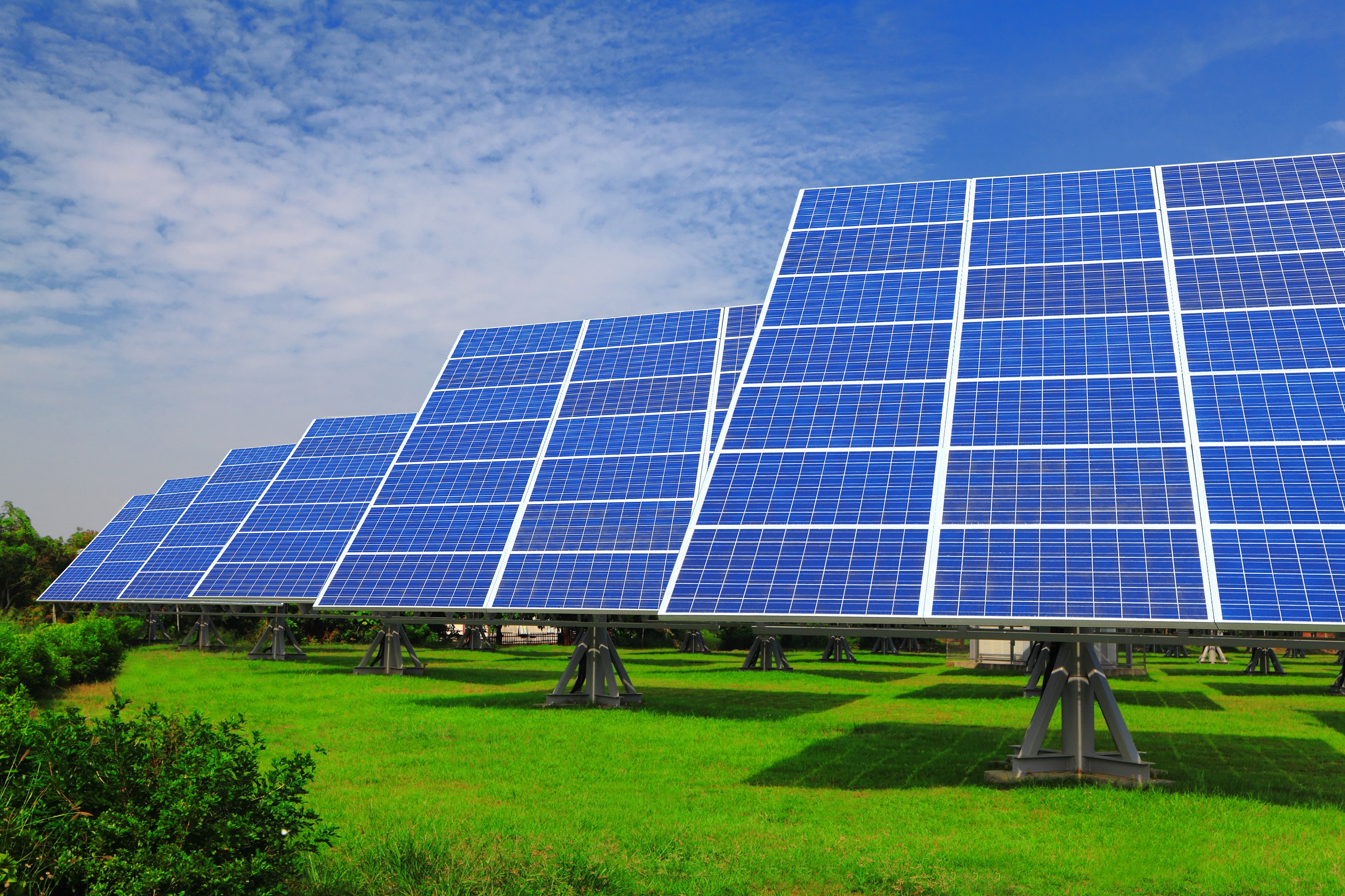 Solar Panel with green grass and beautiful blue sky