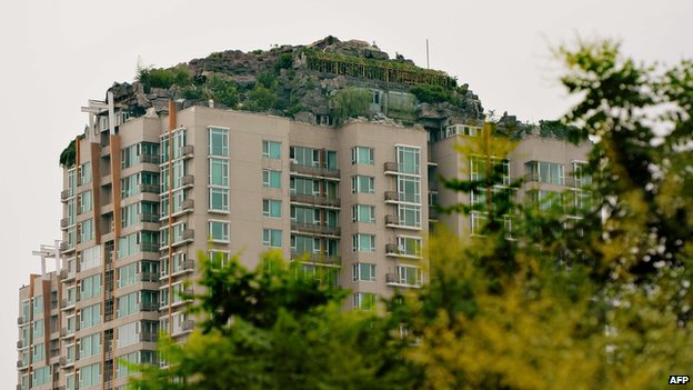 Beijing-man-builds-rock-villa-atop-apartment-tower