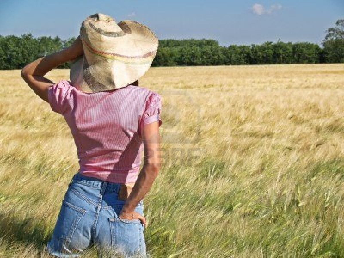 9739677-woman-farmer-in-a-wheat-crop