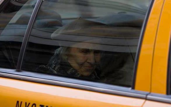 old lady in taxi