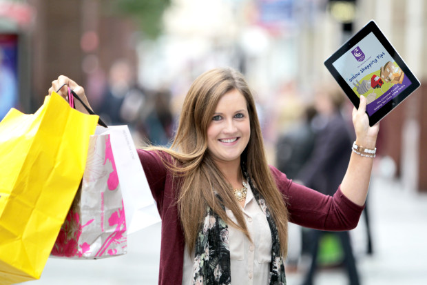 Caption – Consumer Hannah Close checks out the Consumer Council?s ?Online Shopping Tips? guide to ensure she knows her rights and shops safely online.