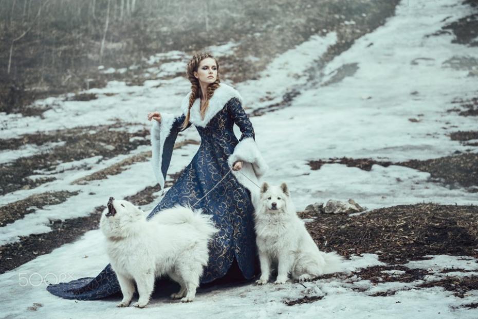 The woman on winter walk with a dog