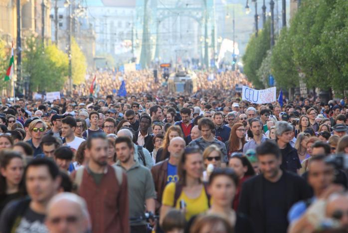 People protest against Prime Minister Viktor Orban’s efforts to force a George Soros-founded university out of the country in Budapest,