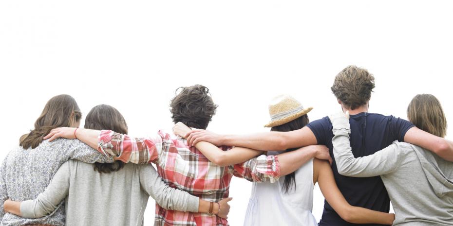 Rear View of Group of Friends Hugging