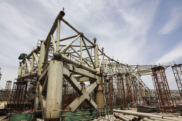 --FILE--View of the construction site of the new Beijing airport, Beijing Daxing International Airport, in Beijing, China, 3 June 2017. Beijing's new airport will serve the Xiongan New Area and the coordinated development of Beijing and surrounding regions, according to a company executive. The airport in Beijing's southern Daxing District will be useful in development of the Xiongan New Area, said Liu Xuesong, general manager of the Capital Airports Holding Company, at the Beijing Global Friend Airports CEO Forum that ended on Thursday (7 September 2017). The new international airport is taking shape. The steel structure of its terminal buildings is complete. A total of 30.8 billion yuan (4.6 billion U.S. dollars) has been spent so far, 39 percent of the total planned investment, according to Liu.