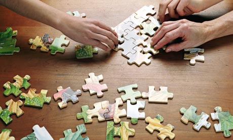 People doing a puzzle