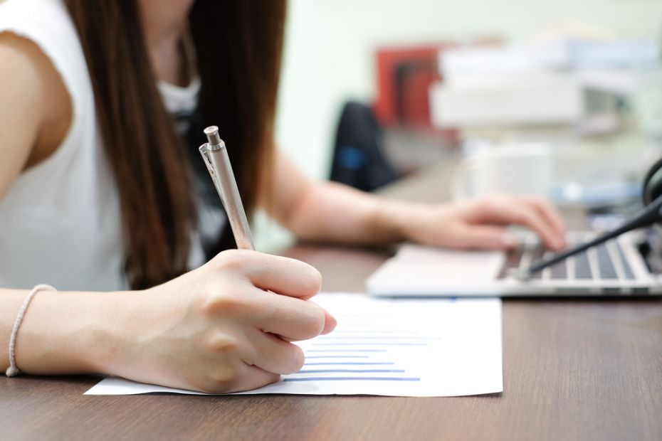 writing-essay-typing-working-on-computer