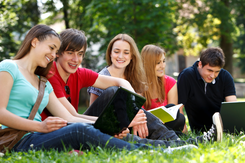 Group of college students studying at campus