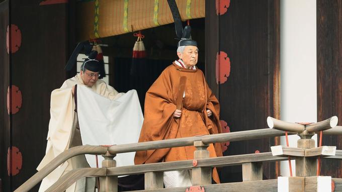 Japan’s Emperor Akihito walks for a ritual called Taiirei-Tojitsu-Kashikodokoro-Omae-no-gi, a ceremony for the Emperor to report the conduct of the abdication ceremony, at the Imperial Palace in Tokyo