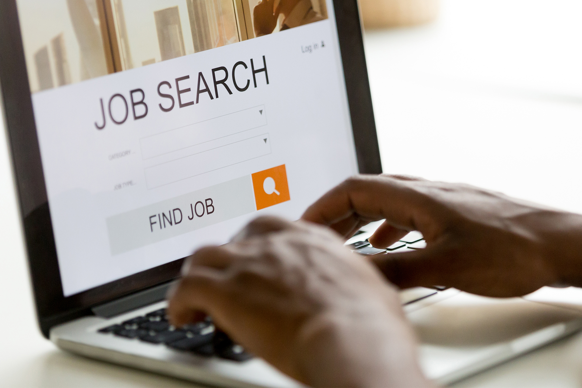 African-american man browsing work online using job search computer app