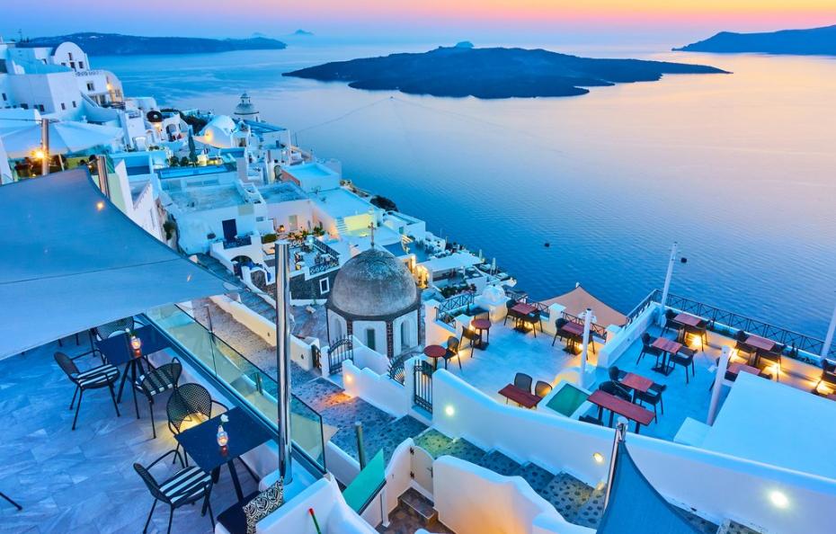 Evening in Santorini – Thira town and Aegean sea at sundown, Gre