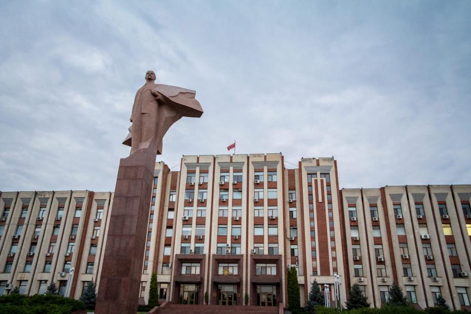 Transnistria Parliament Building In Tiraspol With A Statue Of Vl